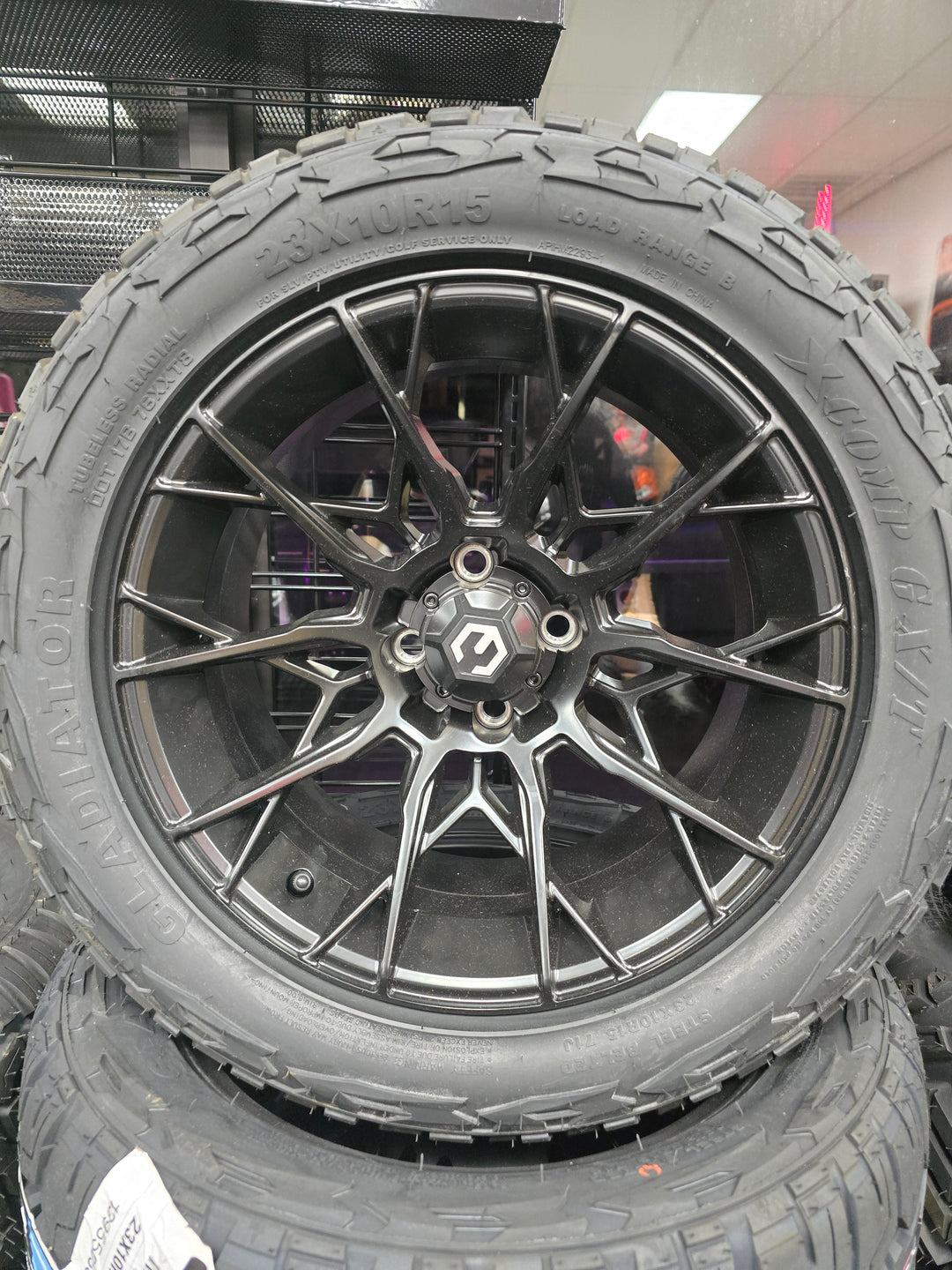 MODZ Choas Matte Black 15″ Golf Cart Wheels on 15x23" XCOMP Hybrid Tires (Set of 4)