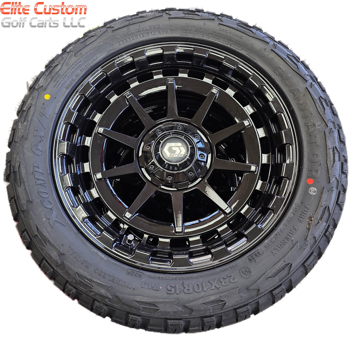 15″ GTW® Barricade Gloss Black Wheels on 15x23" XCOMP X/T Tires (Set of 4)