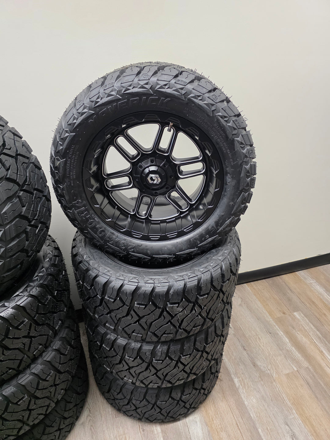 14″ GTW® Titan Black w/Machined Face Golf Cart Wheels on 14x23" Maverick All Terrain Tires (Set of 4)