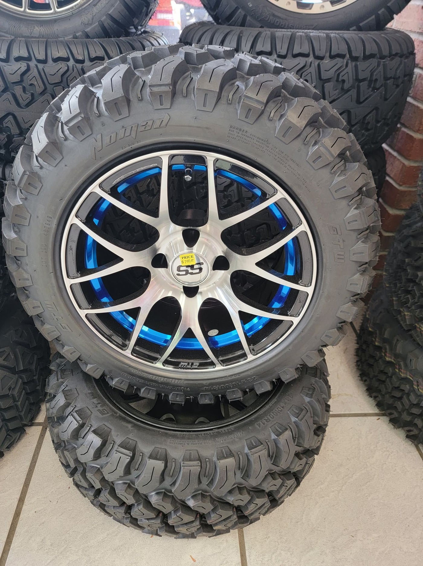 GOLF CART 14" GTW PURSUIT BLUE WHEELS ON 14x23" NOMAD ALL TERRAIN TIRES (SET OF 4) optional Lugs